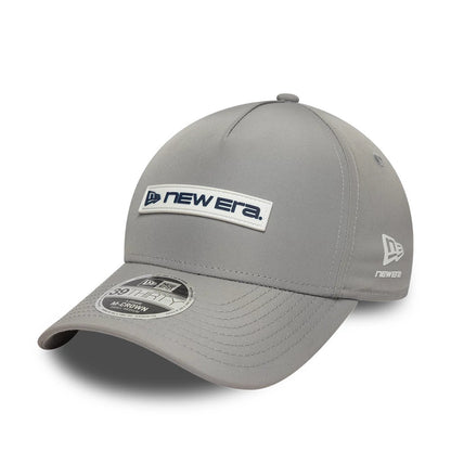 Pictured is this New Era Rubber Patch 39THIRTY M-Crown A-Frame Stretch Fit cap in grey. 1