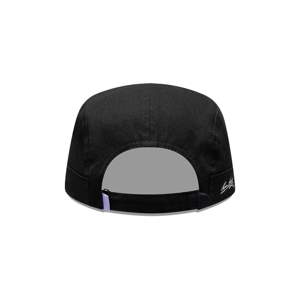 Pictured is this New Era X Hermanos Koumori Running Camper cap in black. 5