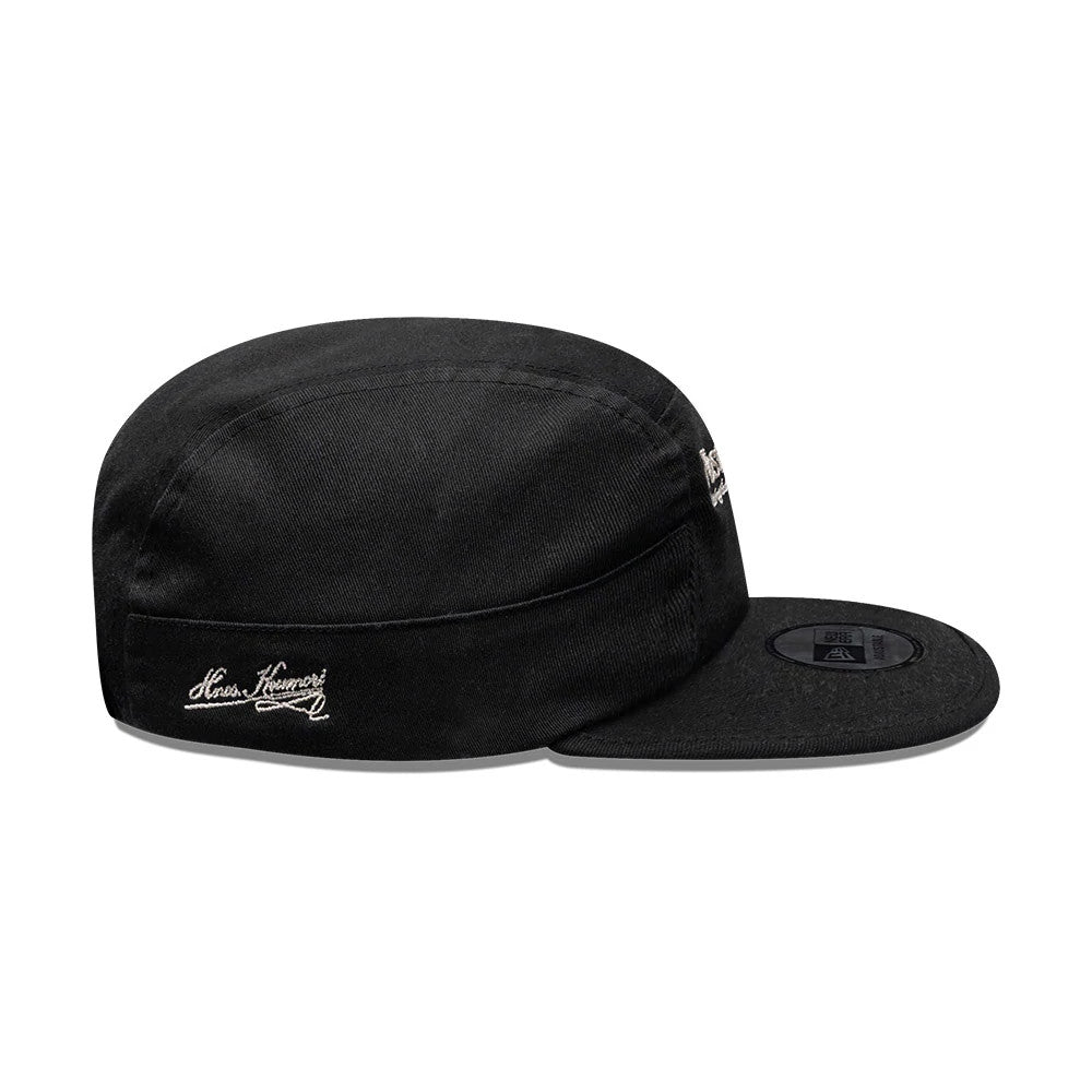 Pictured is this New Era X Hermanos Koumori Running Camper cap in black. 4