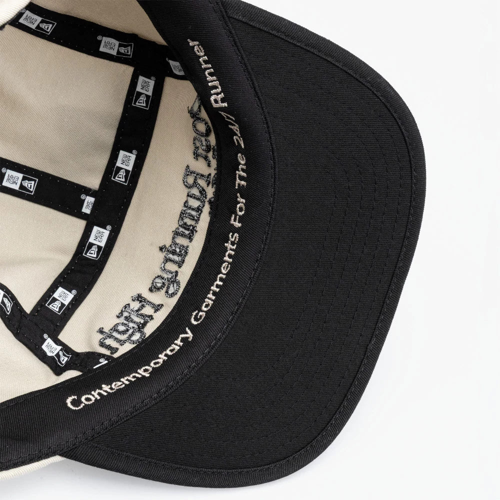 Pictured is this New Era X Hermanos Koumori Running Camper cap in light beige. 6