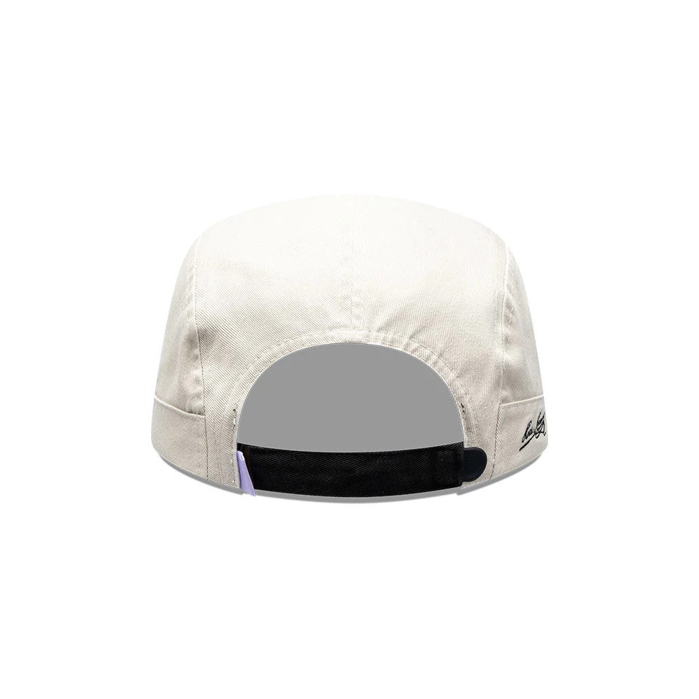 Pictured is this New Era X Hermanos Koumori Running Camper cap in light beige. 4
