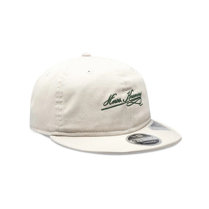 Pictured is this New Era X Hermanos Koumori Cursive Retro Crown 9FIFTY cap in Cream. 3