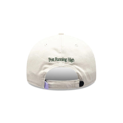 Pictured is this New Era X Hermanos Koumori Cursive Retro Crown 9FIFTY cap in Cream. 5