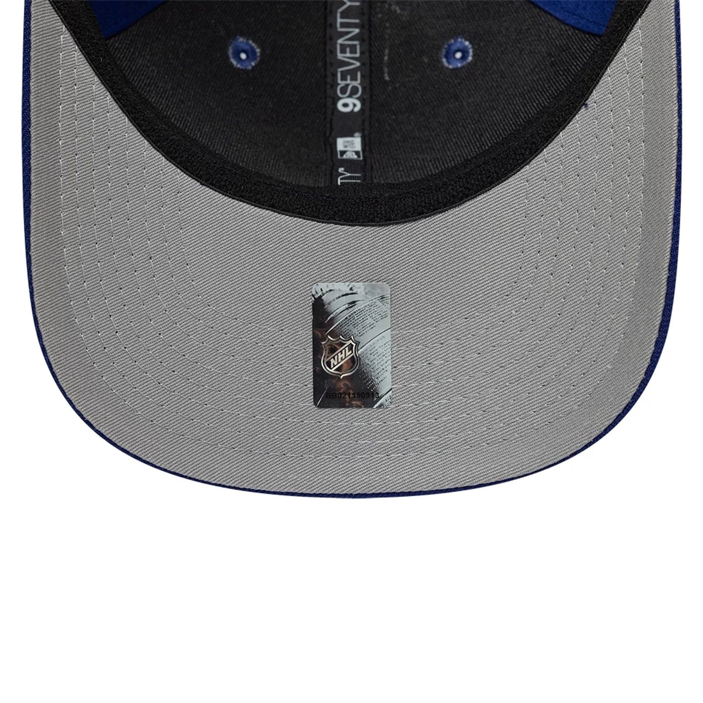Pictured is this NHL Team Tampa Bay Lightning 9SEVENTY Stretch Snap cap in dark blue. 2