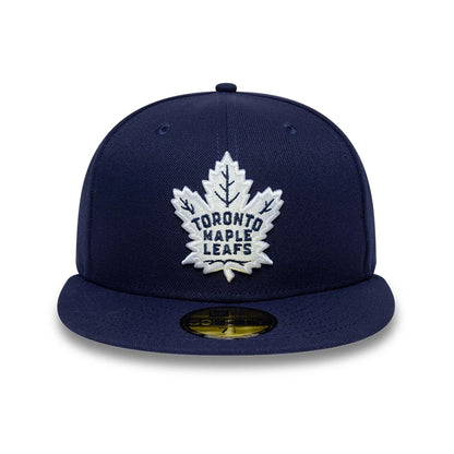 Pictured is this NHL Basic Toronto Maple Leafs 59FIFTY Fitted cap in navy. 3
