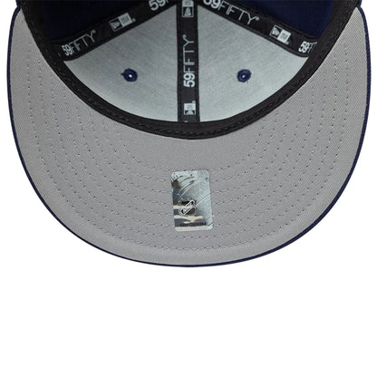 Pictured is this NHL Basic Toronto Maple Leafs 59FIFTY Fitted cap in navy. 2