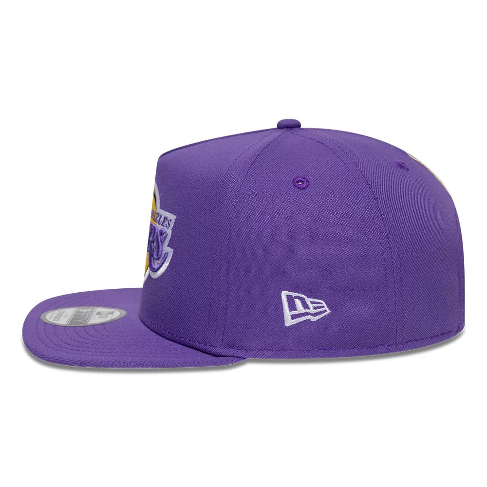Pictured is this NBA Hardwood Classic LA Lakers 9FIFTY A-Frame Snapback cap in purple. 5