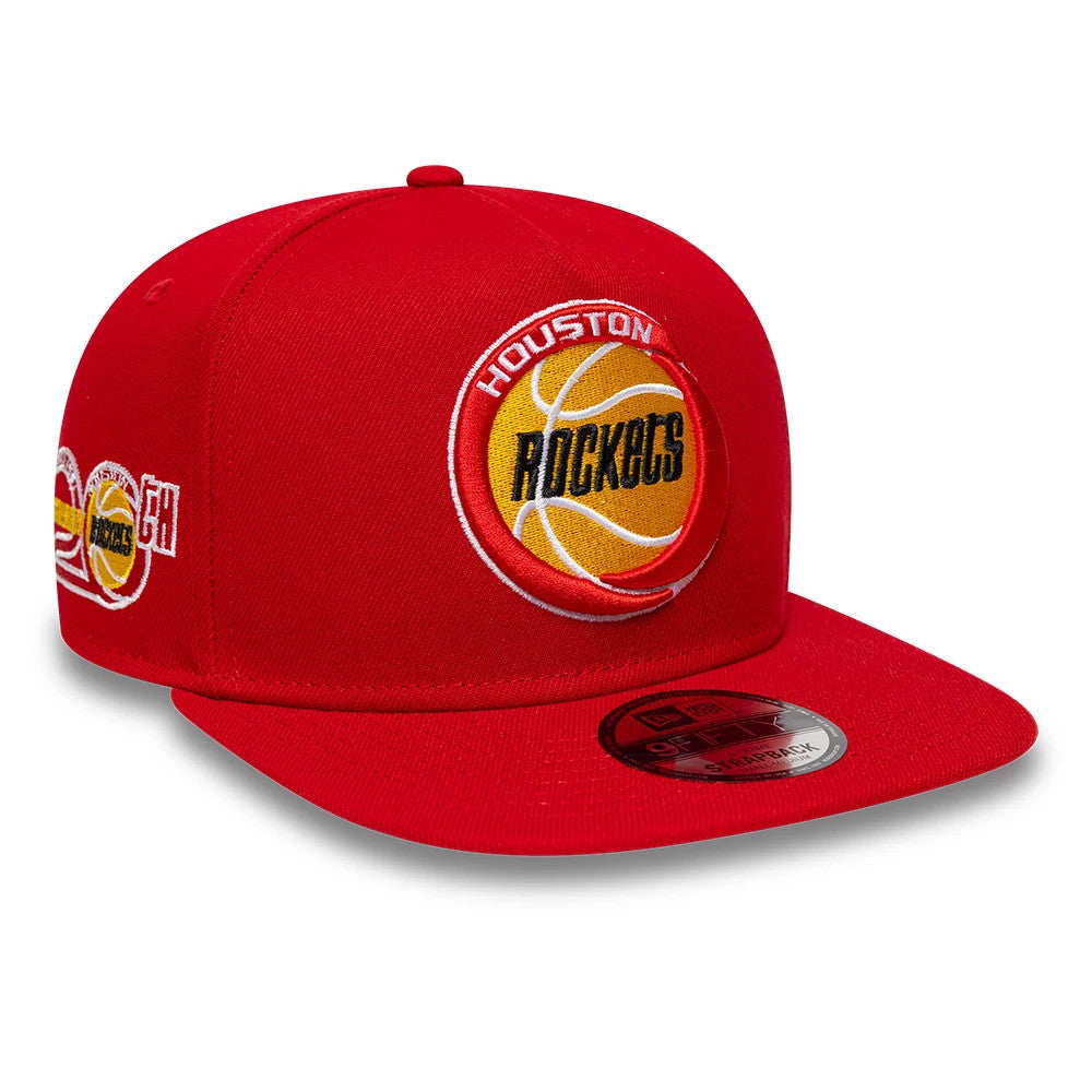 Pictured is this NBA Hardwood Classic Houston Rockets 9FIFTY A-Frame Snapback cap in red. 1