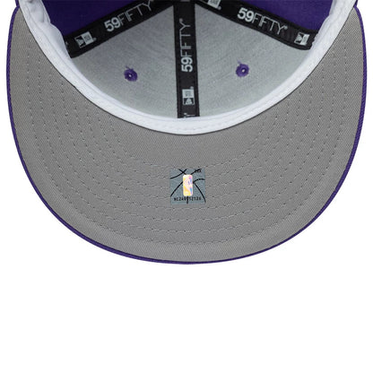 LA Lakers NBA Hardwood Classic Purple New Era 59FIFTY Fitted Cap, inside view with a grey undervisor, black 59FIFTY taping along the seams, purple top button and eyelets, and an NBA authentication sticker at the centre.