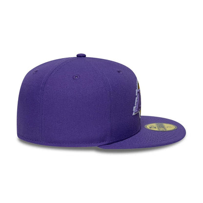 Pictured is this NBA Hardwood Classic LA Lakers 59FIFTY Fitted cap in purple. 7