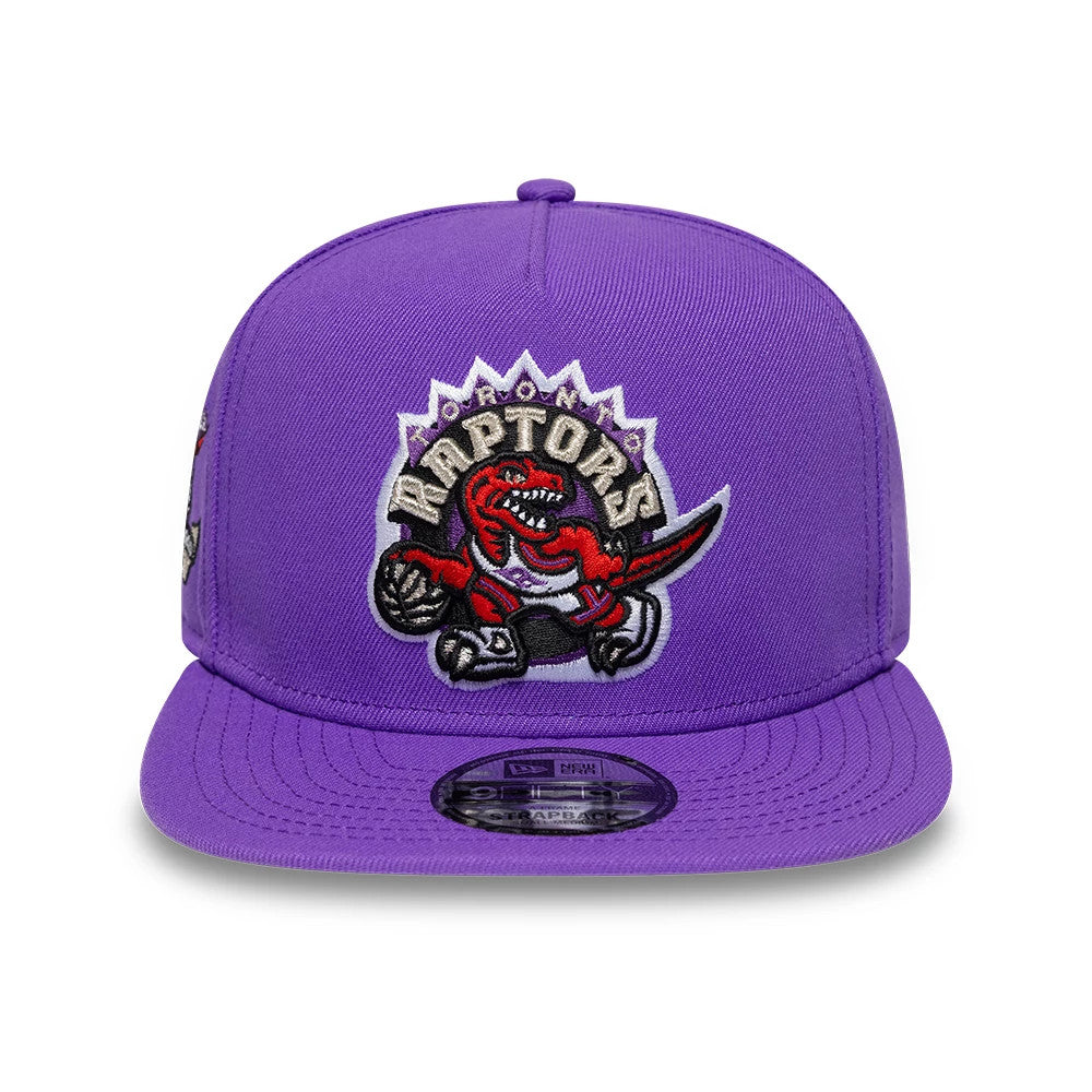 Pictured is this NBA Hardwood Classic Toronto Raptors 9FIFTY A-Frame Snapback cap in bright purple. 3