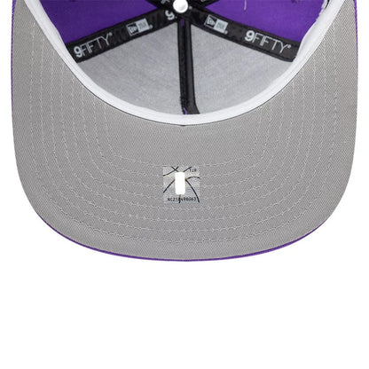 Pictured is this NBA Hardwood Classic Toronto Raptors 9FIFTY A-Frame Snapback cap in bright purple. 2