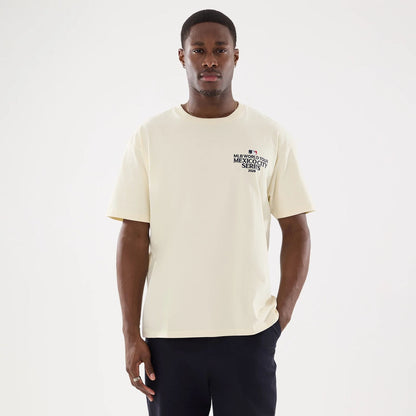 The model is wearing this MLB Mexico City Series 2026 Dueling Logo T-Shirt in Cream. 7