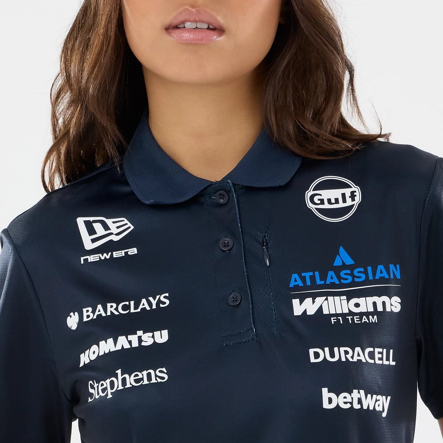 The model is wearing this Womens Williams GB Race Special Tech Polo T-Shirt  in navy. 4