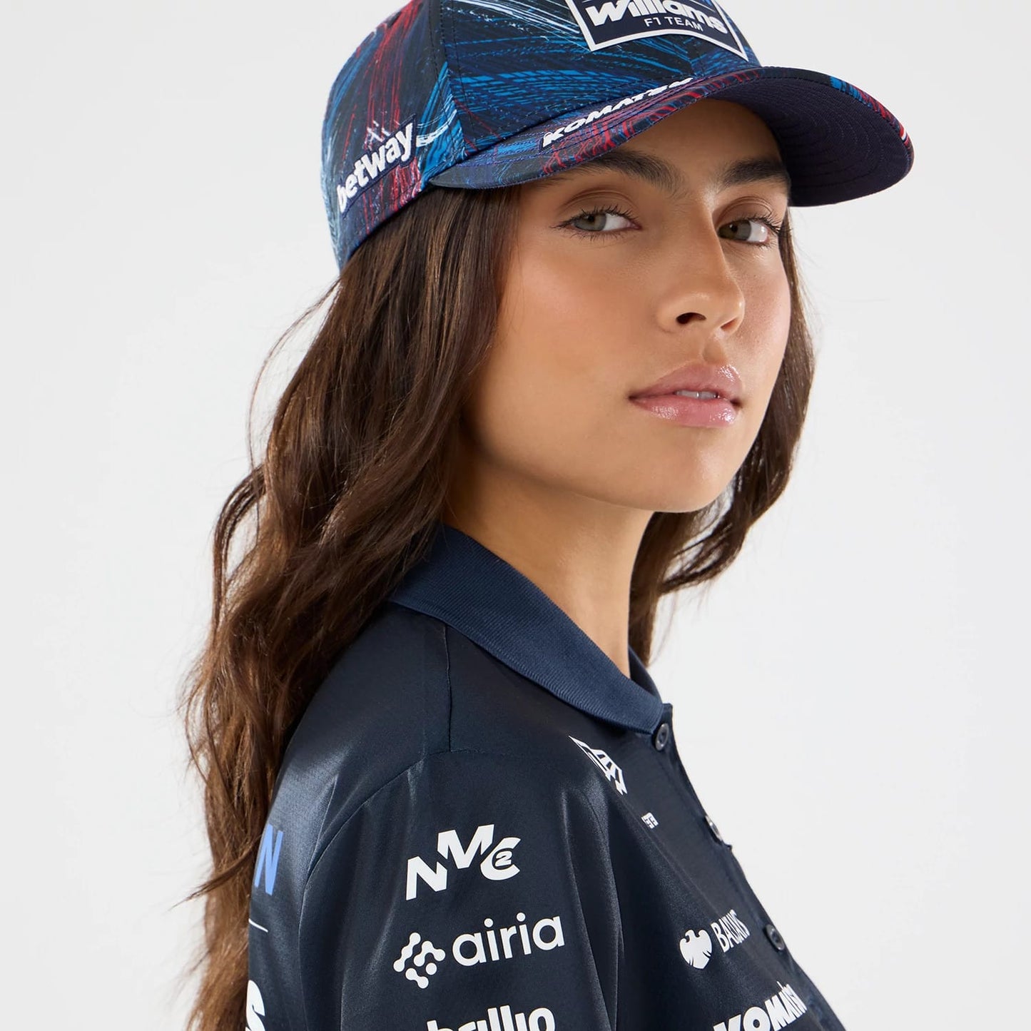 The model is wearing this Womens Williams GB Race Special Tech Polo T-Shirt  in navy. 6