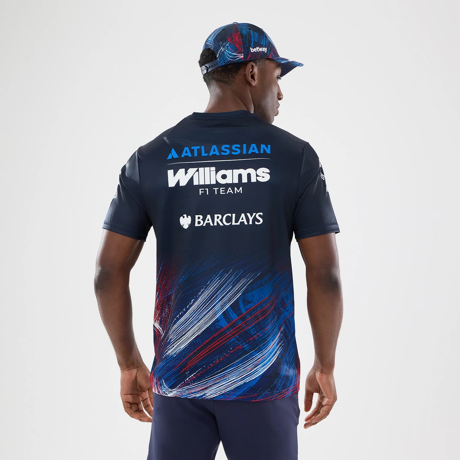 The model is wearing this Williams GB Race Special Tech T-Shirt  in navy. 2