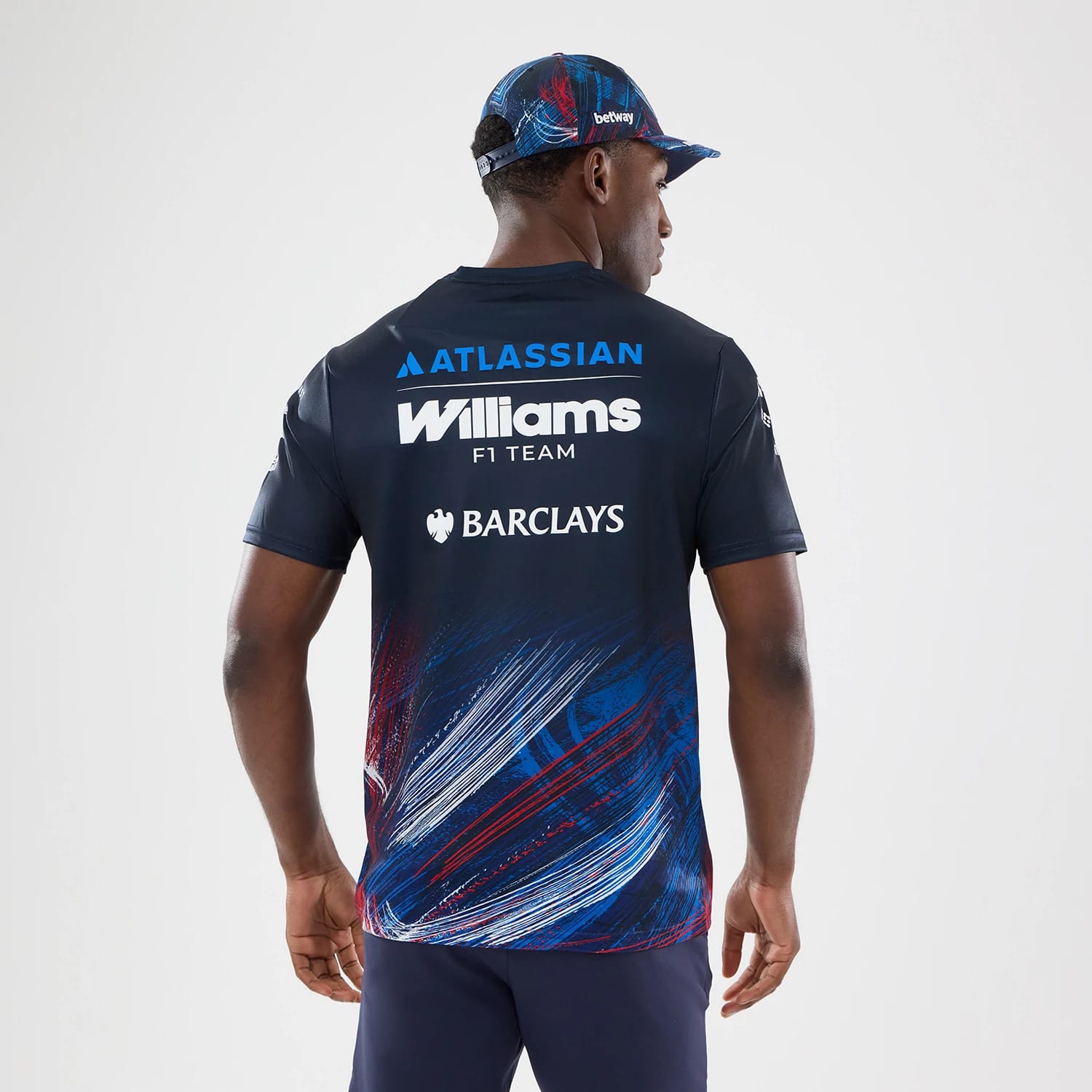 The model is wearing this Williams GB Race Special Tech T-Shirt  in navy. 2