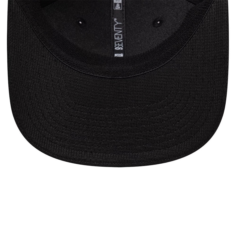 TGR Haas F1 Vegas Race Special Black New Era 9SEVENTY Stretch Snap Adjustable Cap, inside view showing black taping, a black sweatband, and a matching black undervisor with the New Era 9SEVENTY branding on the interior taping.