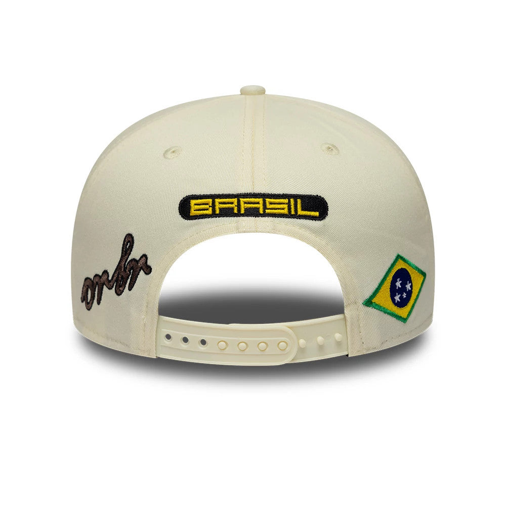 Pictured is this Brazil Race Special Team Red Bull Racing 9SEVENTY Stretch Snap cap in cream. 5