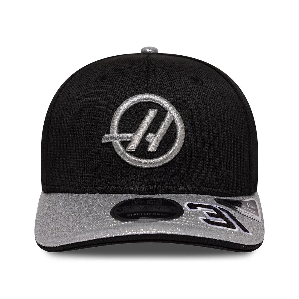 Pictured is this Esteban Ocon Vegas Race Special TGR Haas F1 9SEVENTY Stretch Snap cap in black. 2