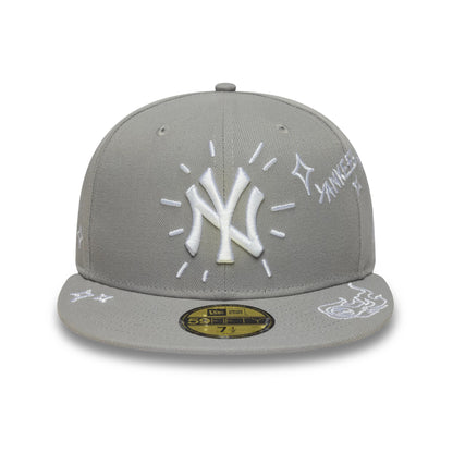 New York Yankees MLB Scribble Grey New Era 59FIFTY Fitted Cap, front view showing the white embroidered NY logo with surrounding scribble designs, flat grey visor with white graphics, and a gold 59FIFTY size sticker on the visor.
