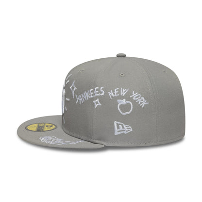 New York Yankees MLB Scribble Grey New Era 59FIFTY Fitted Cap, side view showing white embroidered doodles including Yankees, New York, a star, and an apple on the structured grey crown, with the New Era flag logo near the visor.