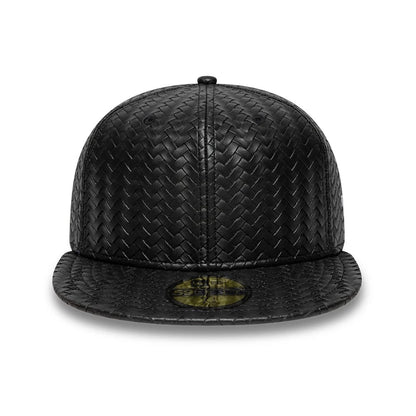 Pictured is this New Era Woven PU 59FIFTY Fitted cap in black. 2