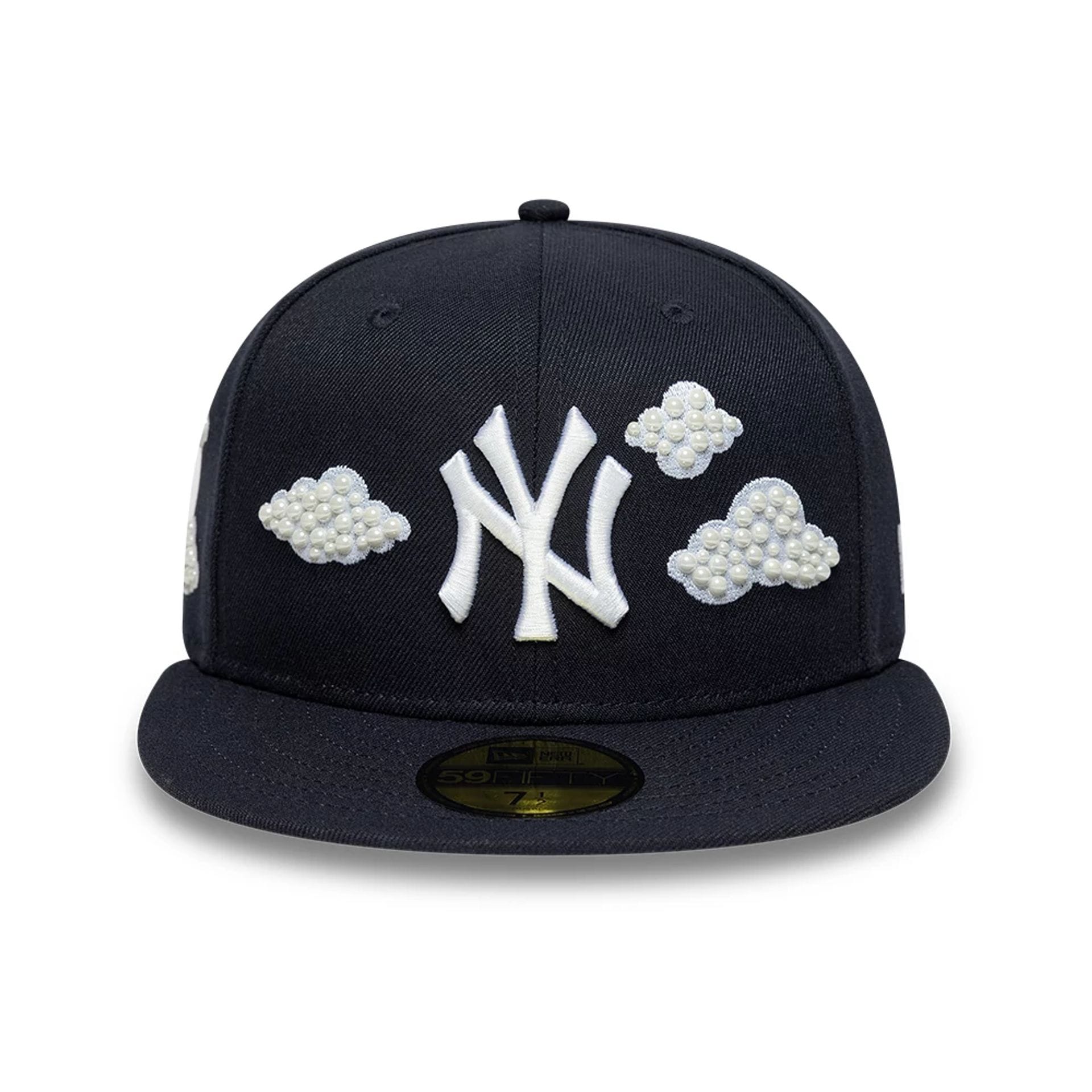 Pictured is this MLB Faux Pearl New York Yankees 59FIFTY Fitted cap in navy. 4