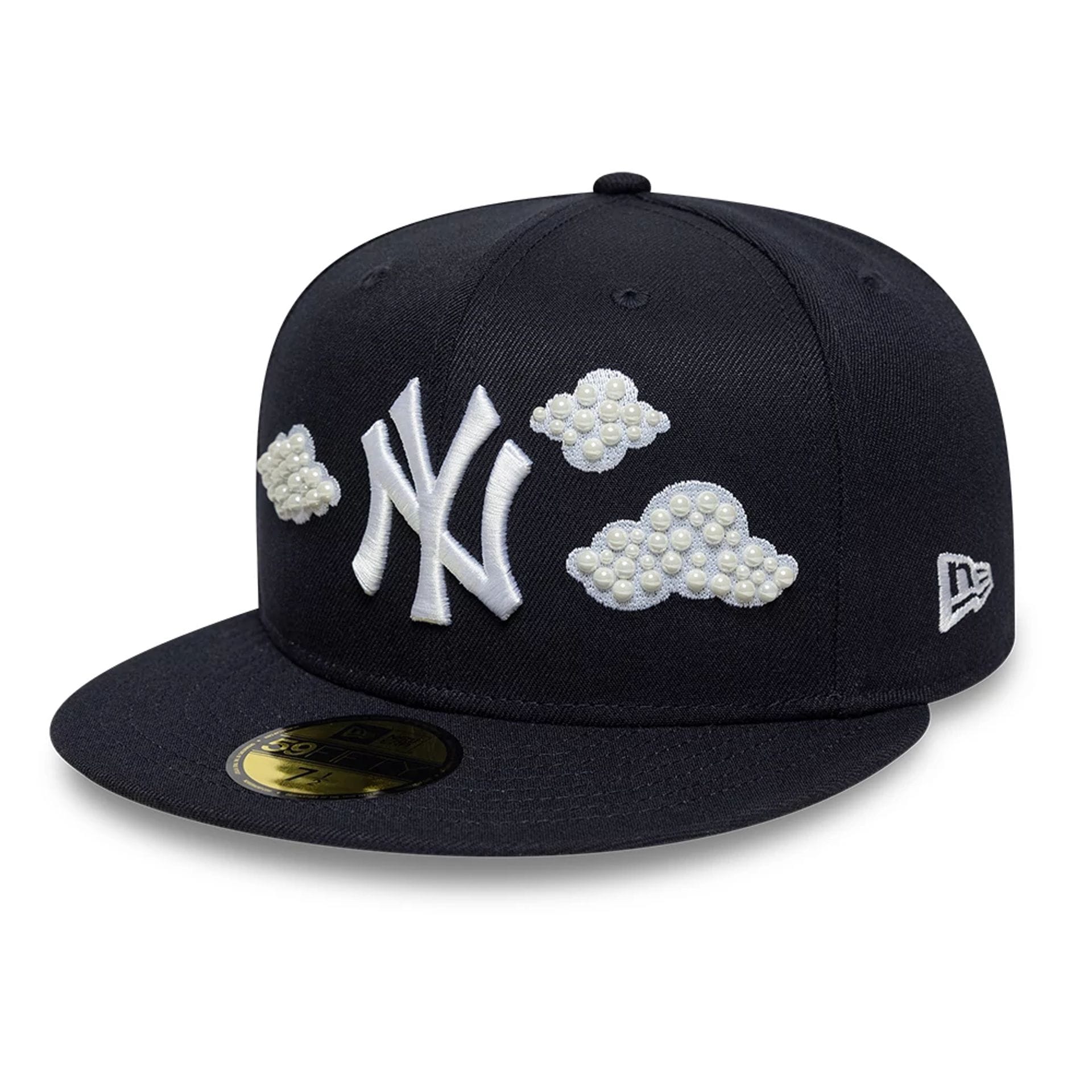 Pictured is this MLB Faux Pearl New York Yankees 59FIFTY Fitted cap in navy. 1