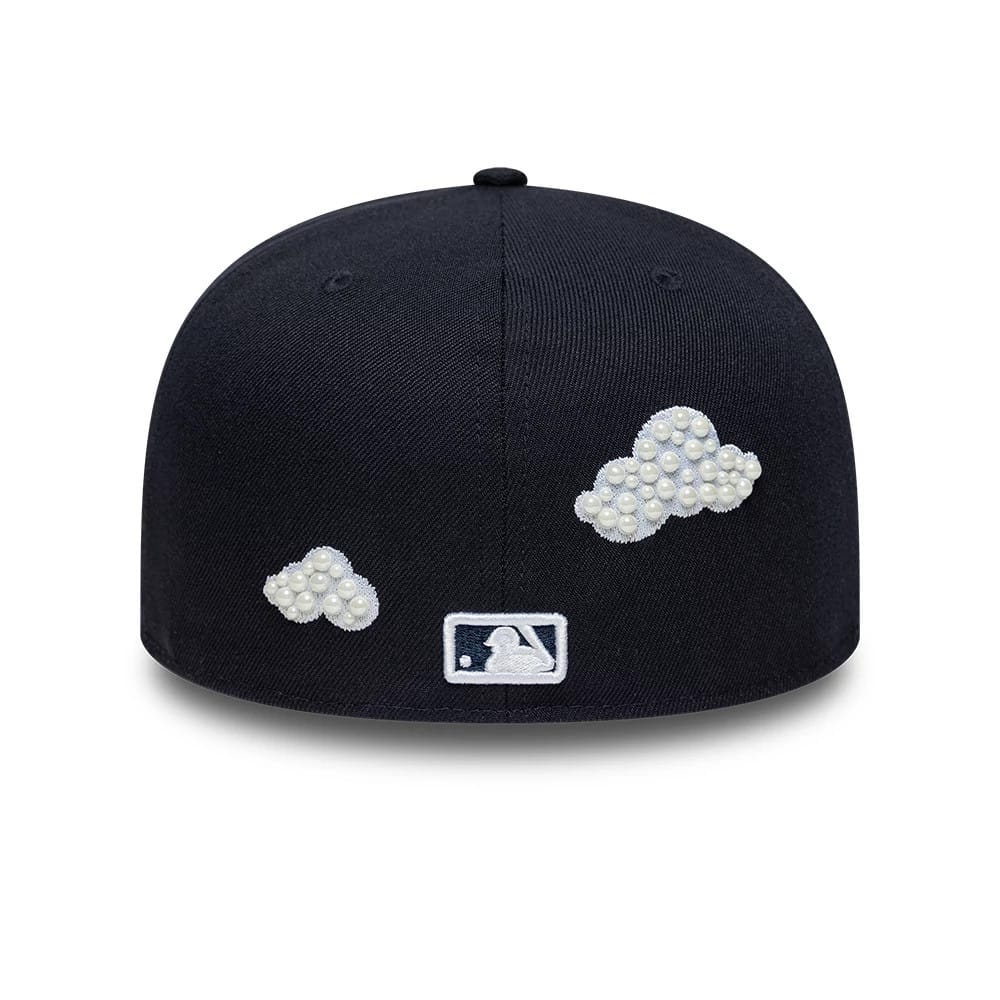 Pictured is this MLB Faux Pearl New York Yankees 59FIFTY Fitted cap in navy. 3