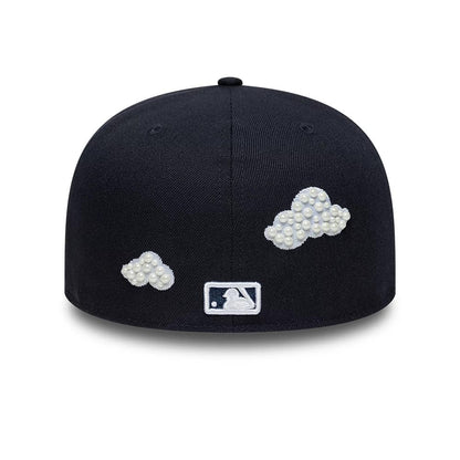 Pictured is this MLB Faux Pearl New York Yankees 59FIFTY Fitted cap in navy. 3