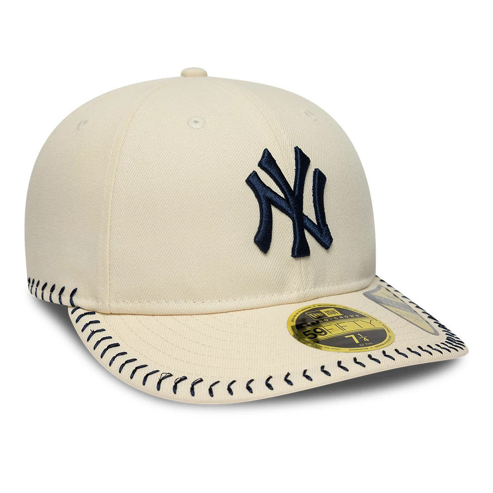Pictured is this MLB Baseball Stitch New York Yankees Retro Crown 59FIFTY Fitted cap in Cream. 3