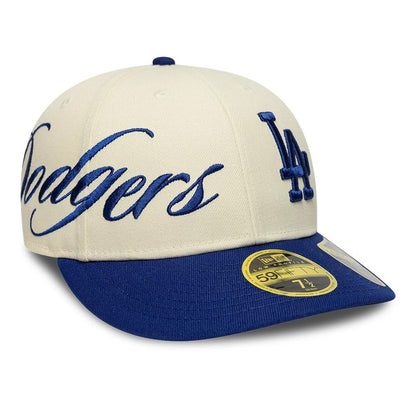 Pictured is this MLB Side Script LA Dodgers Low Profile 59FIFTY Fitted cap in Cream. 1