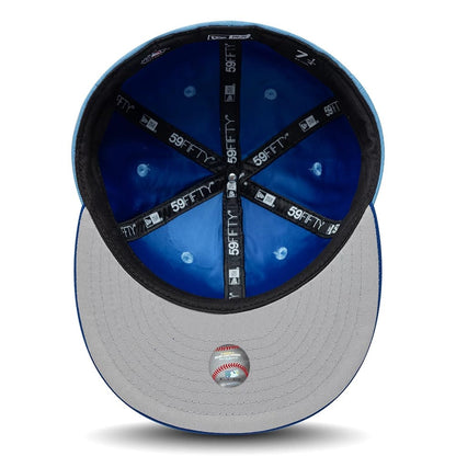 Pictured is this MLB Multi Logo Kansas City Royals 59FIFTY Fitted cap in pastel blue. 2