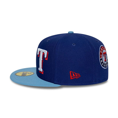 Pictured is this MLB Multi Logo Texas Rangers 59FIFTY Fitted cap in dark blue. 7