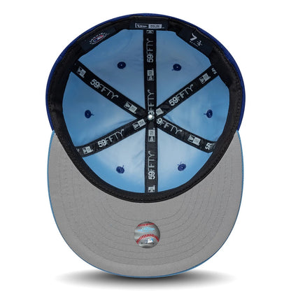 Pictured is this MLB Multi Logo Texas Rangers 59FIFTY Fitted cap in dark blue. 2