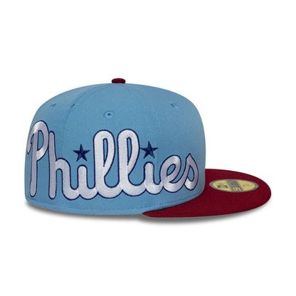 Pictured is this MLB Multi Logo Philadelphia Phillies 59FIFTY Fitted cap in pastel blue. 6