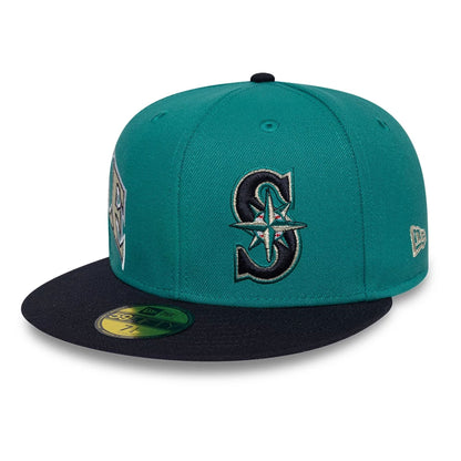 Pictured is this MLB Multi Logo Seattle Mariners 59FIFTY Fitted cap in green. 1