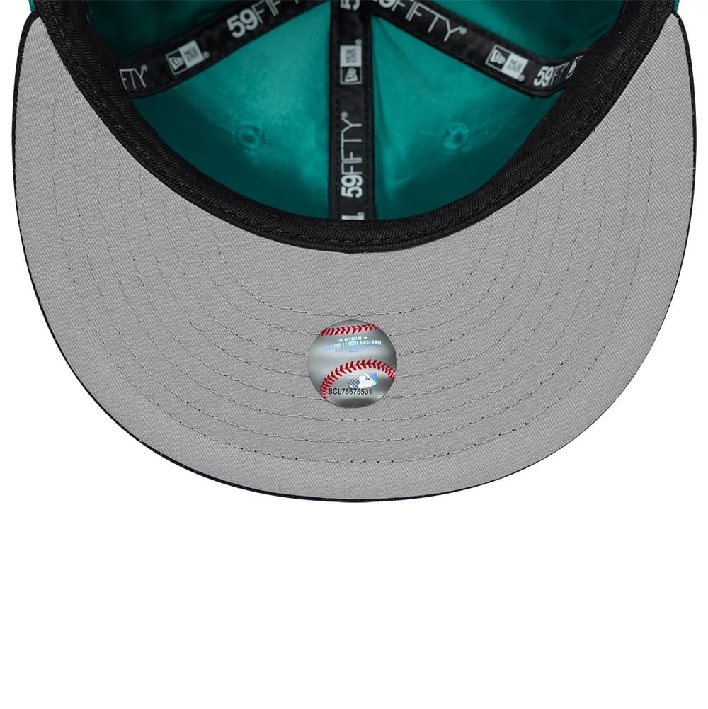 Pictured is this MLB Multi Logo Seattle Mariners 59FIFTY Fitted cap in green. 2
