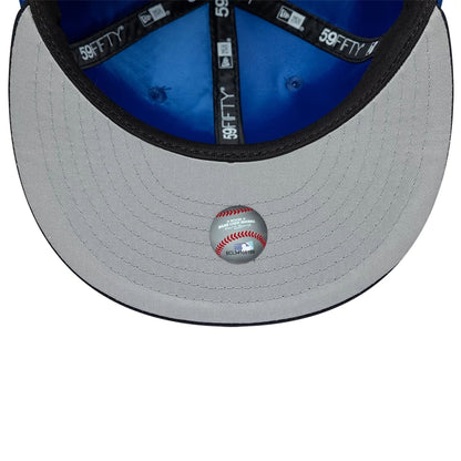 Pictured is this MLB Multi Logo LA Dodgers 59FIFTY Fitted cap in blue. 2