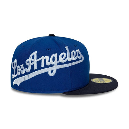 Pictured is this MLB Multi Logo LA Dodgers 59FIFTY Fitted cap in blue. 5