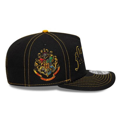 Harry Potter Hufflepuff Black New Era 19TWENTY Adjustable Cap, three-quarter view showing the intricate, colourful embroidered Hogwarts crest on the front panel, the yellow H initial on the side.