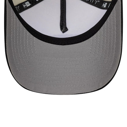 Harry Potter Hogwarts White & Black New Era 9FORTY A-Frame Adjustable Cap, inside view showing a light grey undervisor with black edging, white sweatband contrasting with black taped seams, and detailed stitching for a clean finish.