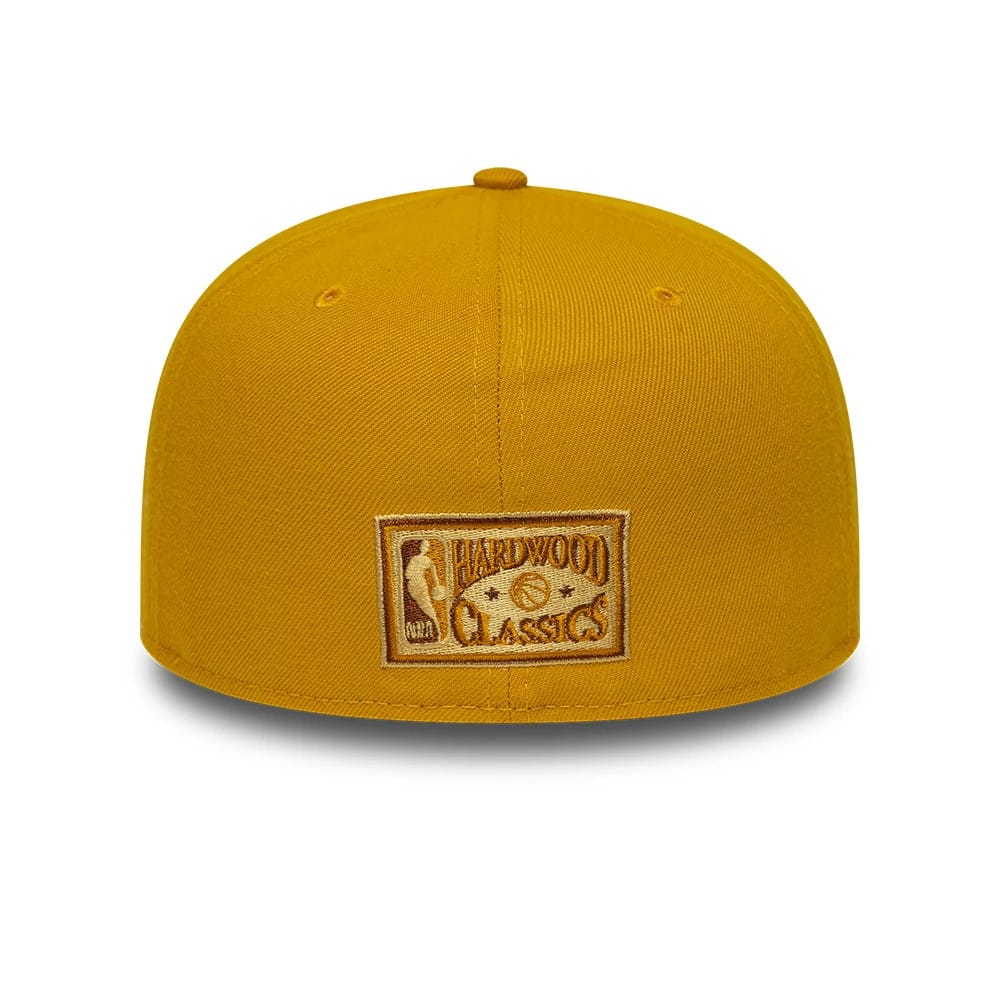 Pictured is this NBA Boston Celtics 59FIFTY A-Frame Fitted cap in gold. 5