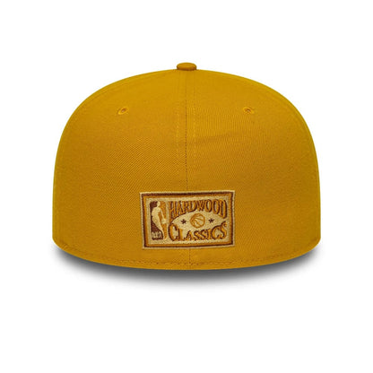 Pictured is this NBA Boston Celtics 59FIFTY A-Frame Fitted cap in gold. 5