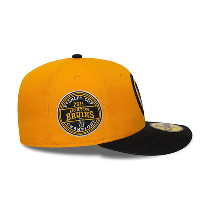 Pictured is this NHL Champions Boston Bruins 59FIFTY Fitted cap in orange. 6