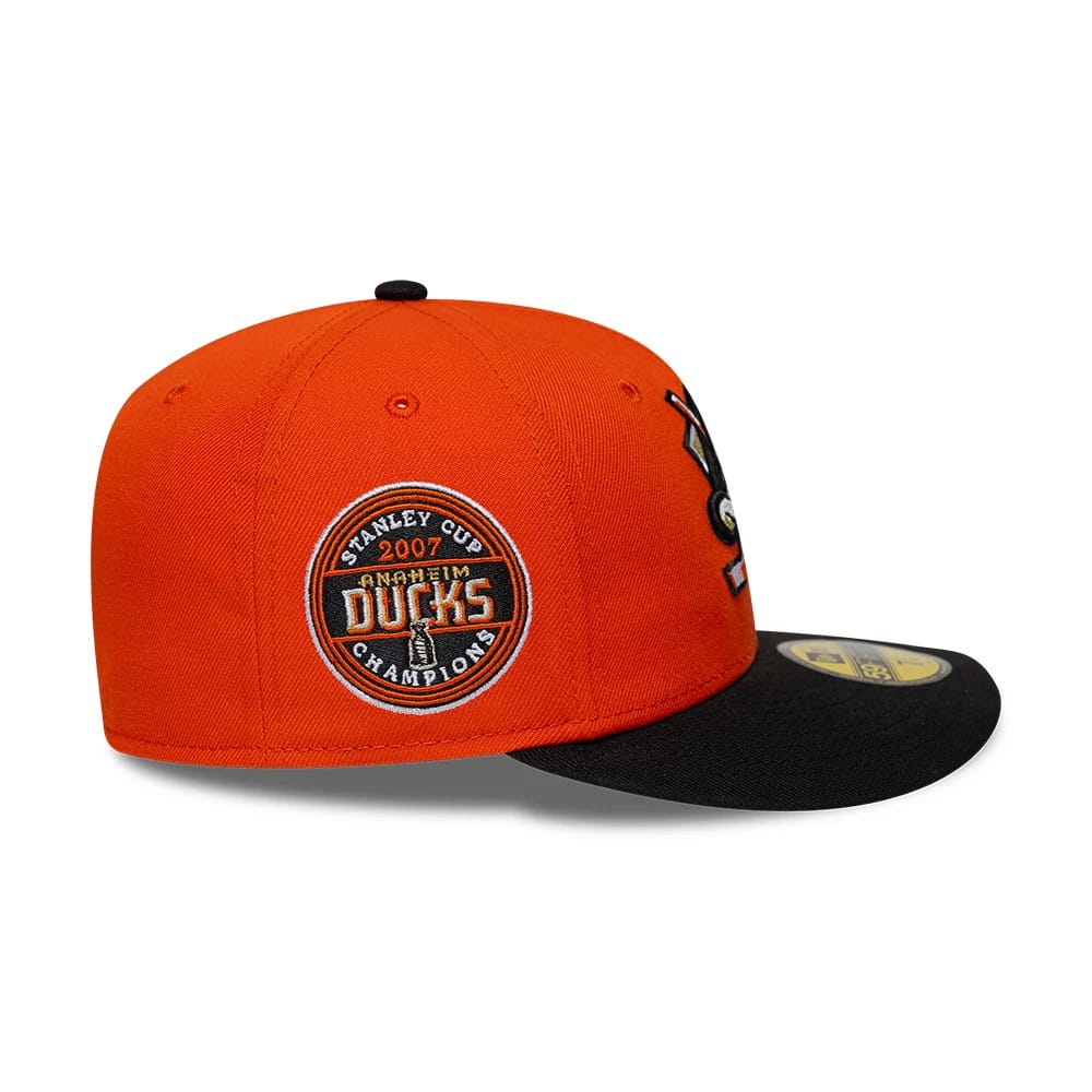 Pictured is this NHL Champions Anaheim Ducks 59FIFTY Fitted cap in orange. 6