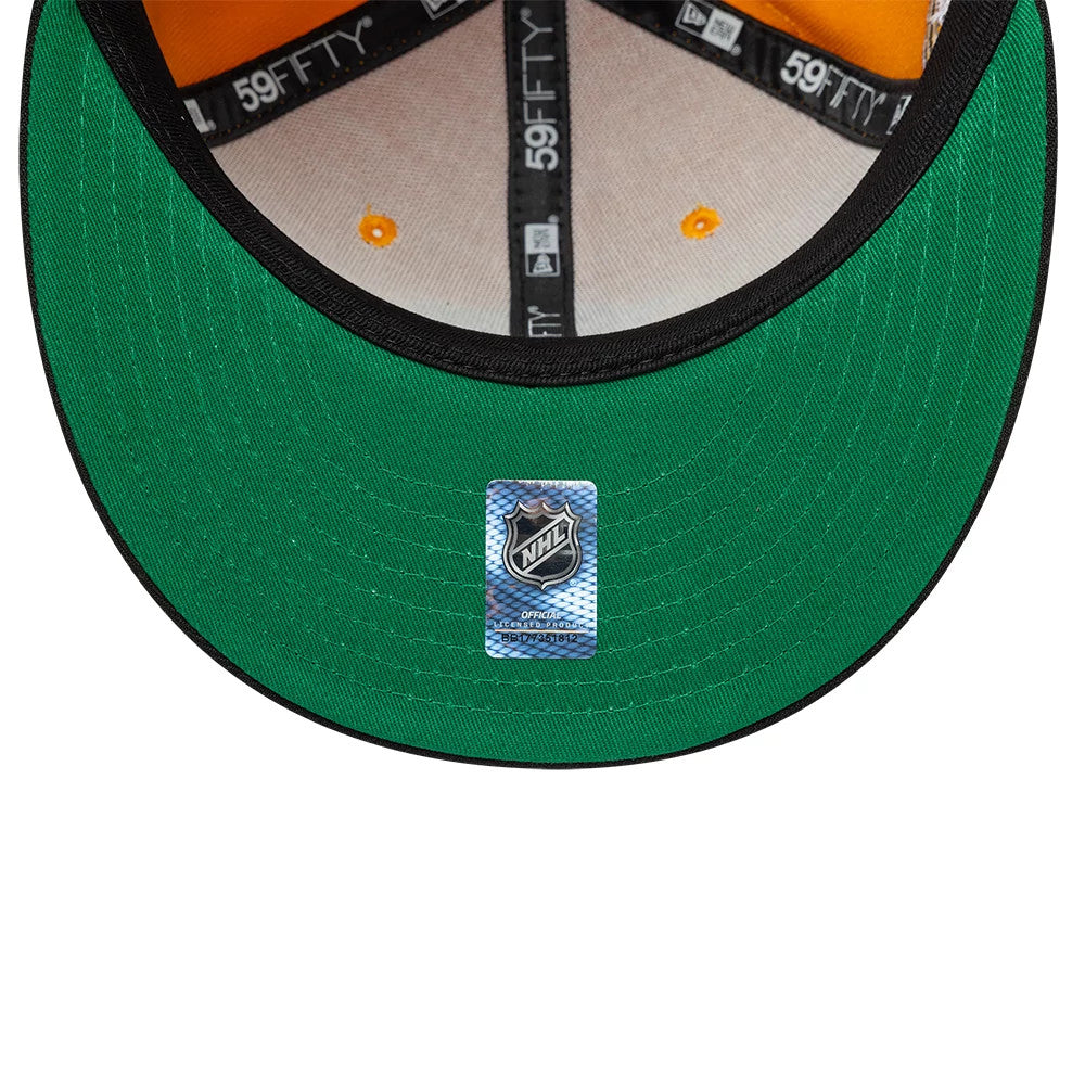 Pictured is this NHL Champions Pittsburgh Penguins 59FIFTY Fitted cap in yellow & black. 2