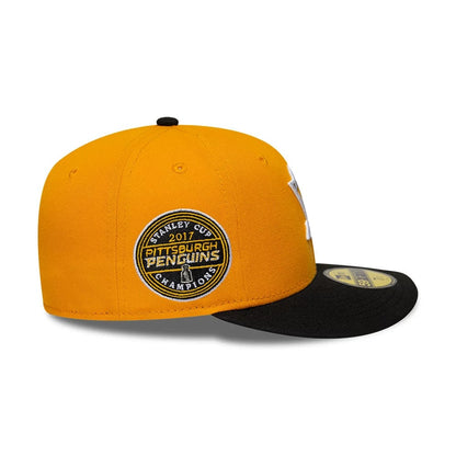 Pictured is this NHL Champions Pittsburgh Penguins 59FIFTY Fitted cap in yellow. 6