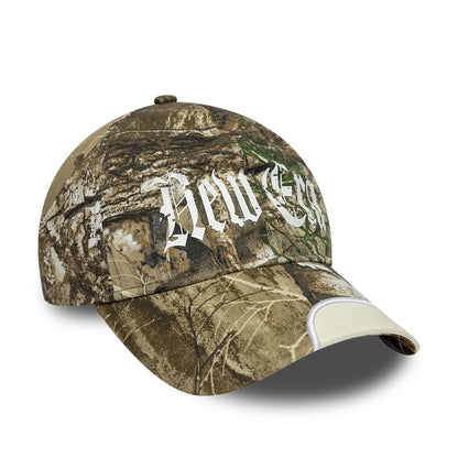 Pictured is this New Era Real Tree 9TWENTY cap in assorted print. 1